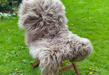 Taupe brown icelandic sheepskin rug on a chair