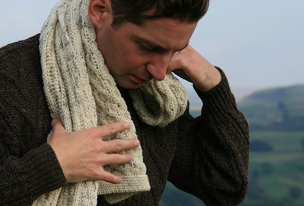 category scarves subheading Knitted aran scarf on model