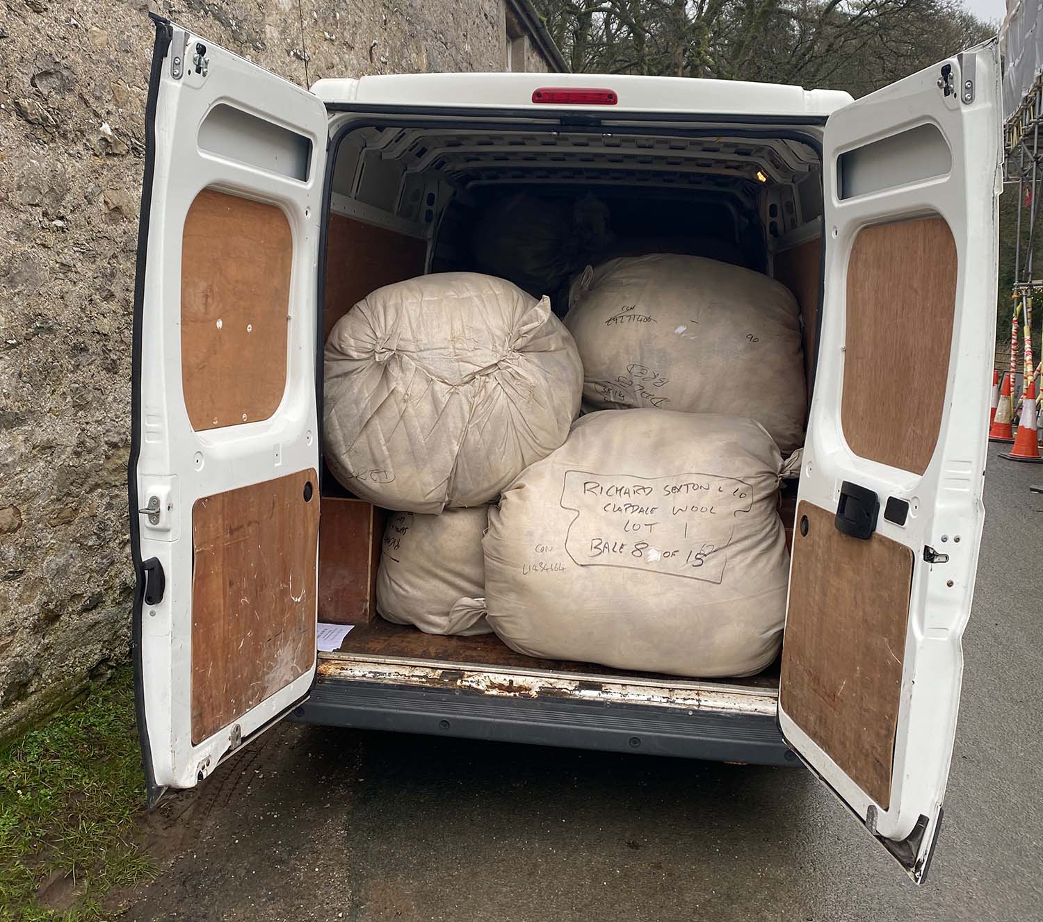Van full of bales of wool
