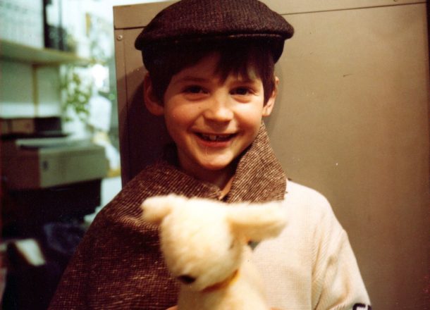 Glencroft partner Edward aged 6 holding a cuddly toy lamb