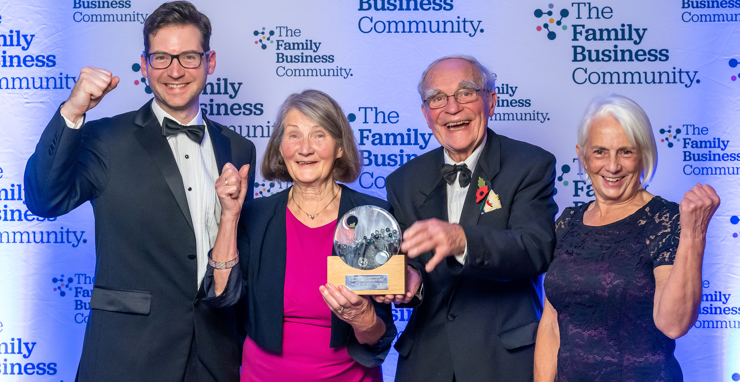 Edward, Justina, Richard and Rose fist pumping the air with the Family Business of the Year Award